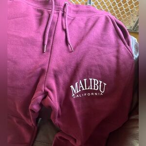 Malibu California red leggings/joggers, size small. Never worn!